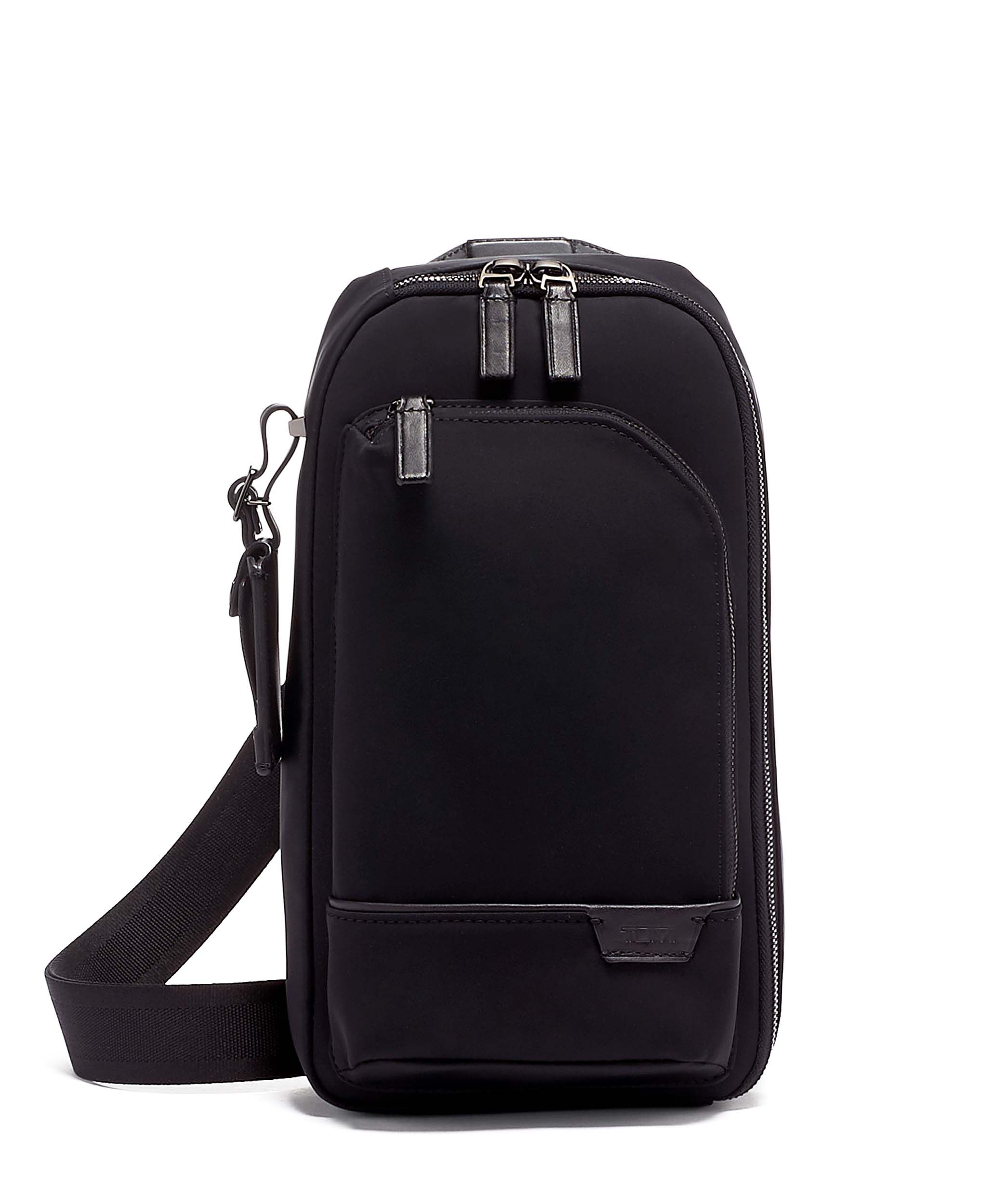 Tumi sling bag leather top
