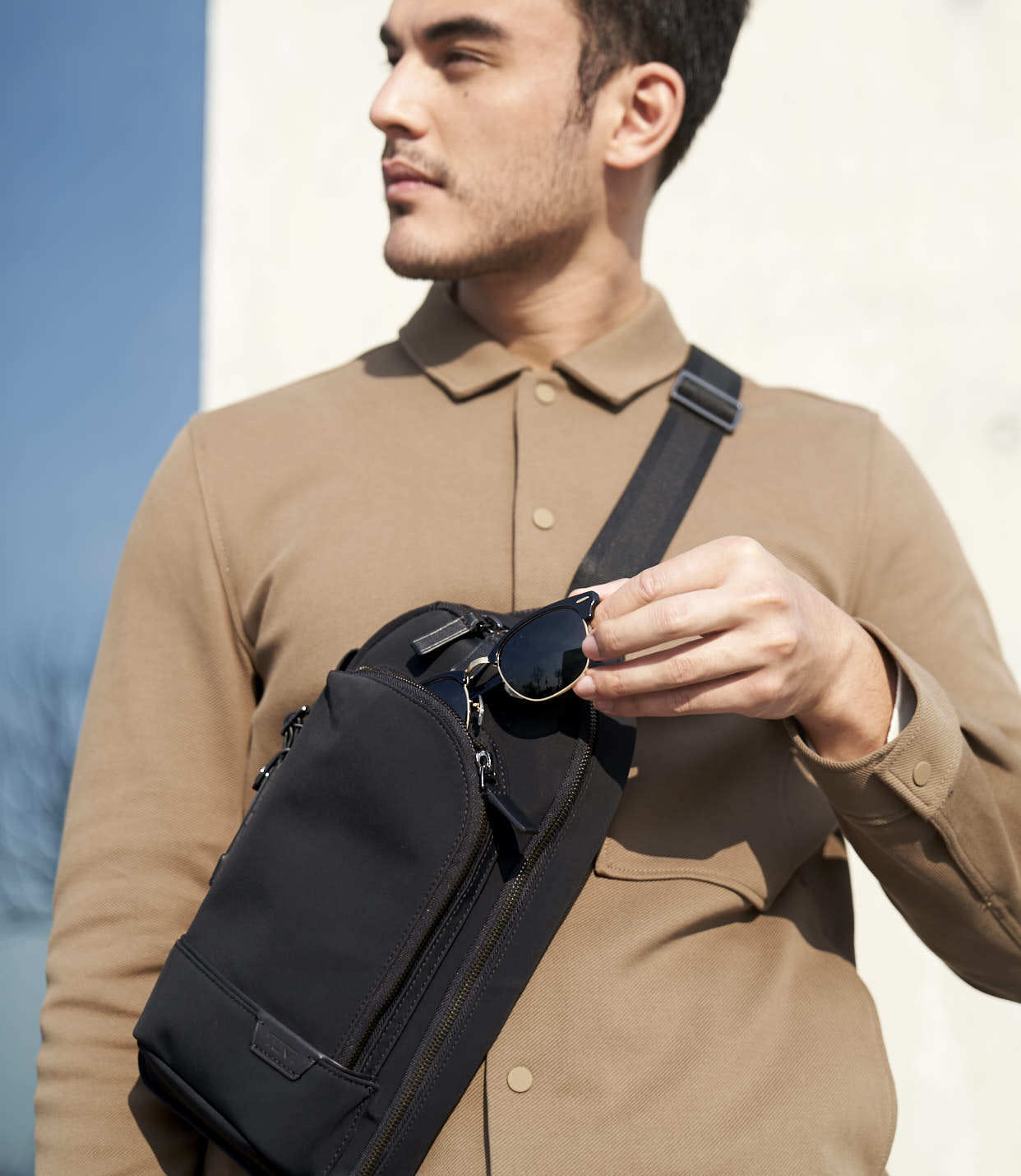 Tumi leather sling bag on sale