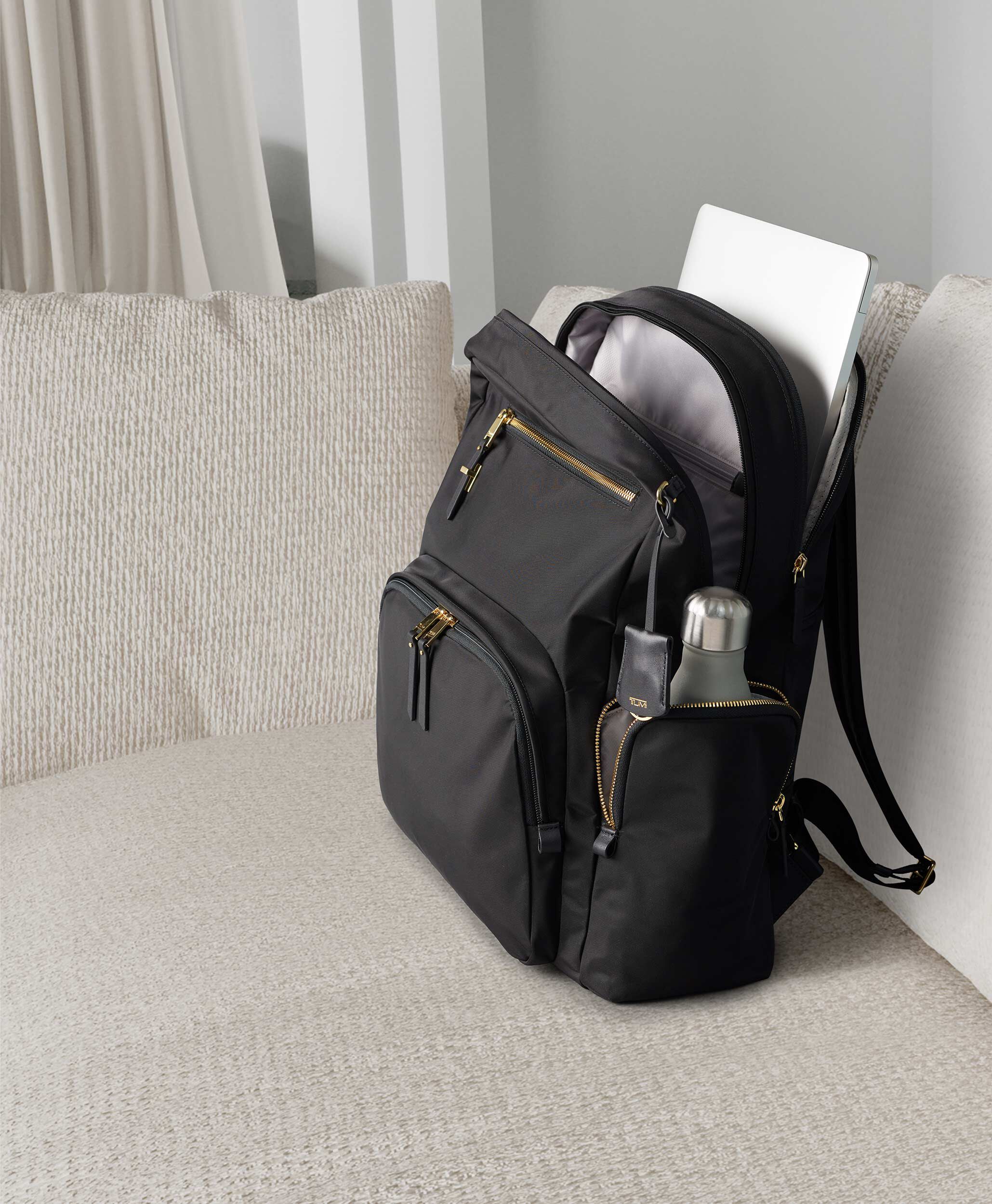 tumi messenger bag women